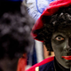 A woman has her face painted to become Zwarte Piet (Black Pete) in the Netherlands. (Robin Van Lonkhuijsen/AFP/Getty Images)